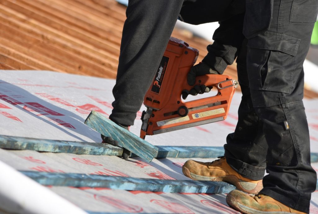 construction worker at work with site insurance