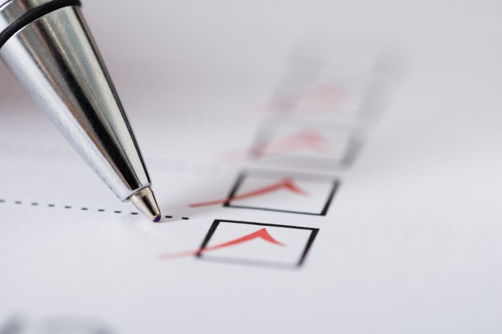silver pen over filled checkboxes insurance